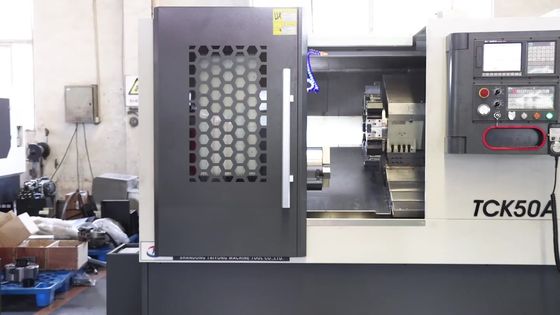 Высокий CNC кровати скоса ригидности обрабатывает машину на токарном станке TCK50A поворачивая с линейным Guideway